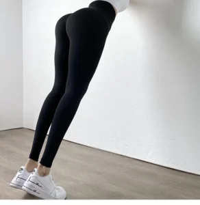 Woman showing high waist shape forming leggings